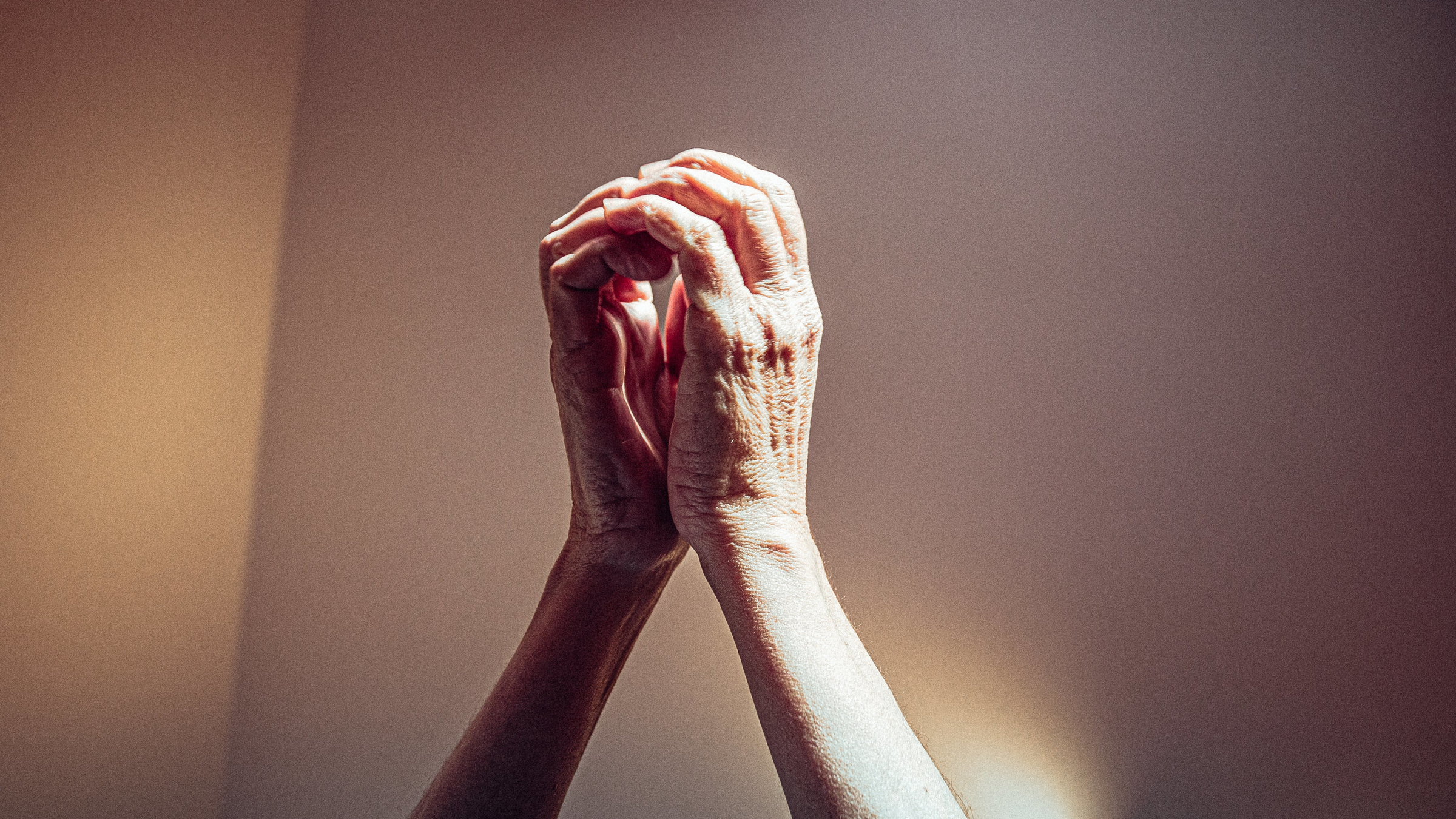 Old Friends Touching Hands